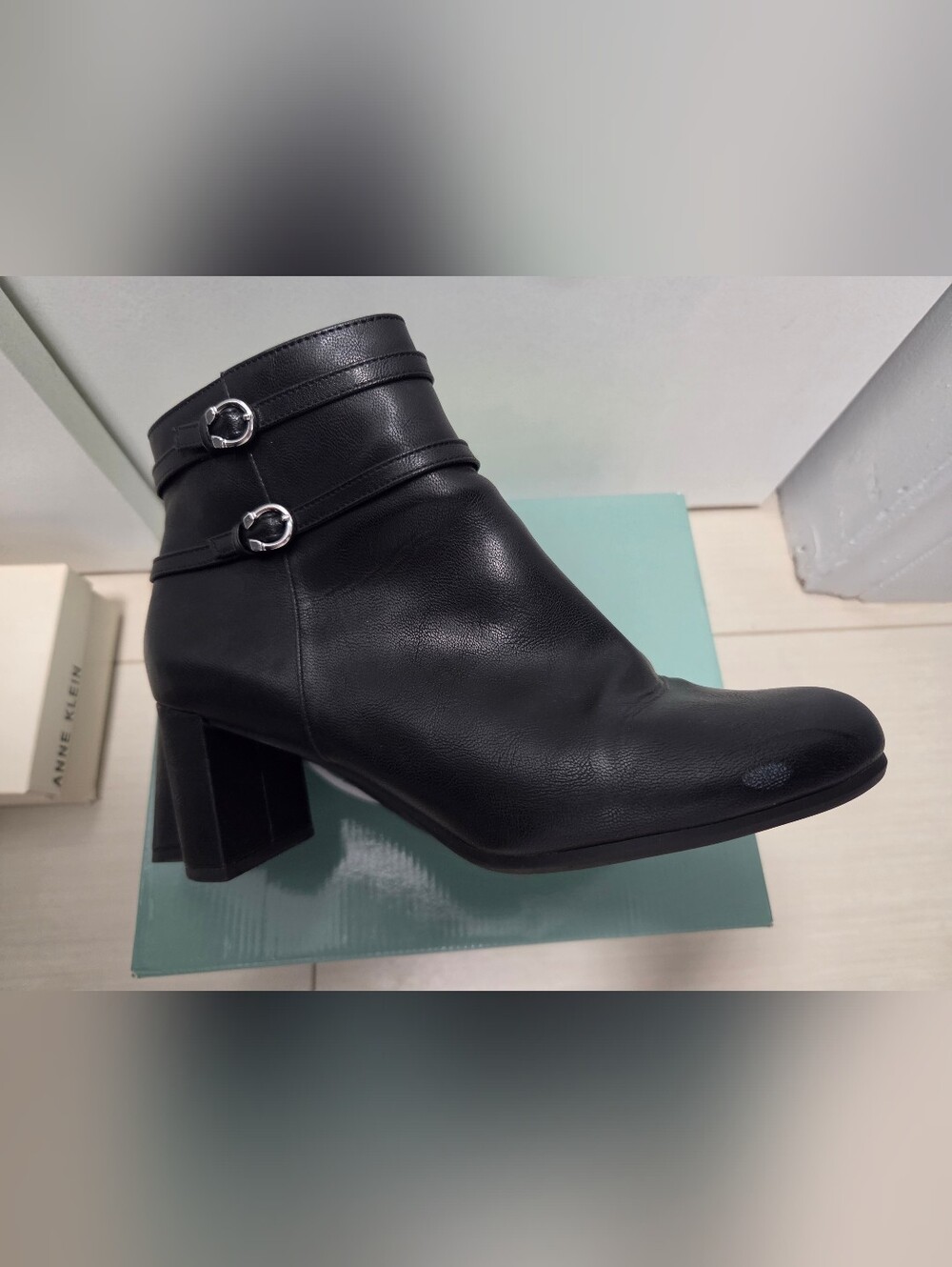 Classic Black Leather Ankle Boots with Buckle Detail